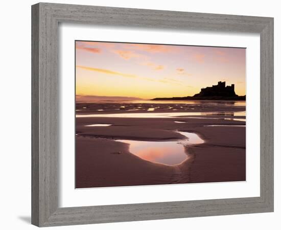 Bamburgh Castle in Silhouette at Sunrise, with Rock Pools on Empty Beach, Northumberland, England-Lee Frost-Framed Photographic Print