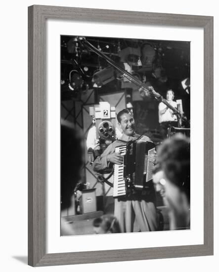 Bandleader Lawrence Welk Playing Accordion Amidst Cameramen on the Set of Weekly TV Show-Allan Grant-Framed Premium Photographic Print