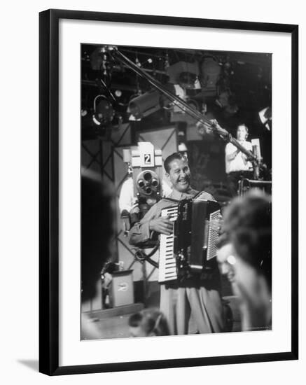 Bandleader Lawrence Welk Playing Accordion Amidst Cameramen on the Set of Weekly TV Show-Allan Grant-Framed Premium Photographic Print