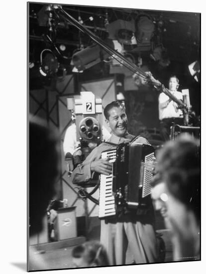 Bandleader Lawrence Welk Playing Accordion Amidst Cameramen on the Set of Weekly TV Show-Allan Grant-Mounted Premium Photographic Print