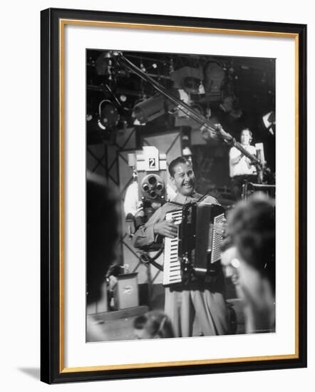 Bandleader Lawrence Welk Playing Accordion Amidst Cameramen on the Set of Weekly TV Show-Allan Grant-Framed Premium Photographic Print