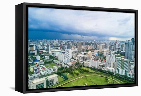 Bangkok, Thailand. Views over downtown Bangkok, Thailand.-Micah Wright-Framed Premier Image Canvas