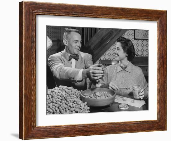 Barbara Angle Helping Her Husband Samuel Angle Prepare Food for the Flying Squirrels-Bernard Hoffman-Framed Photographic Print