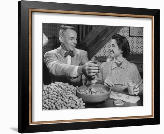 Barbara Angle Helping Her Husband Samuel Angle Prepare Food for the Flying Squirrels-Bernard Hoffman-Framed Photographic Print