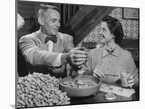 Barbara Angle Helping Her Husband Samuel Angle Prepare Food for the Flying Squirrels-Bernard Hoffman-Mounted Photographic Print