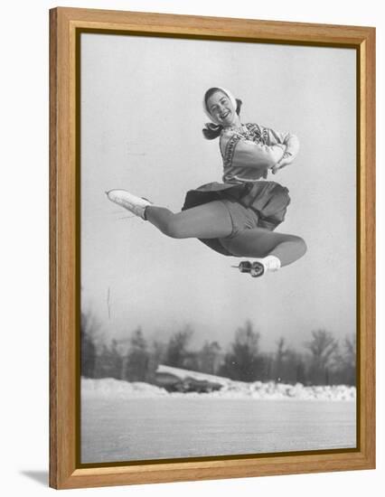 Barbara Ann Scott Smiling as She Leaps in Air on Skates at World Figure Skating Championship-Tony Linck-Framed Premier Image Canvas