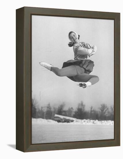 Barbara Ann Scott Smiling as She Leaps in Air on Skates at World Figure Skating Championship-Tony Linck-Framed Premier Image Canvas