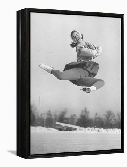 Barbara Ann Scott Smiling as She Leaps in Air on Skates at World Figure Skating Championship-Tony Linck-Framed Premier Image Canvas