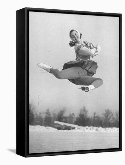 Barbara Ann Scott Smiling as She Leaps in Air on Skates at World Figure Skating Championship-Tony Linck-Framed Premier Image Canvas