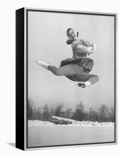 Barbara Ann Scott Smiling as She Leaps in Air on Skates at World Figure Skating Championship-Tony Linck-Framed Premier Image Canvas