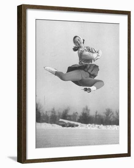 Barbara Ann Scott Smiling as She Leaps in Air on Skates at World Figure Skating Championship-Tony Linck-Framed Premium Photographic Print