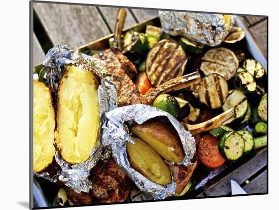 Barbecued Vegetables, Baked Potatoes, Lamb Chops on Barbecue Tray-Herbert Lehmann-Mounted Photographic Print