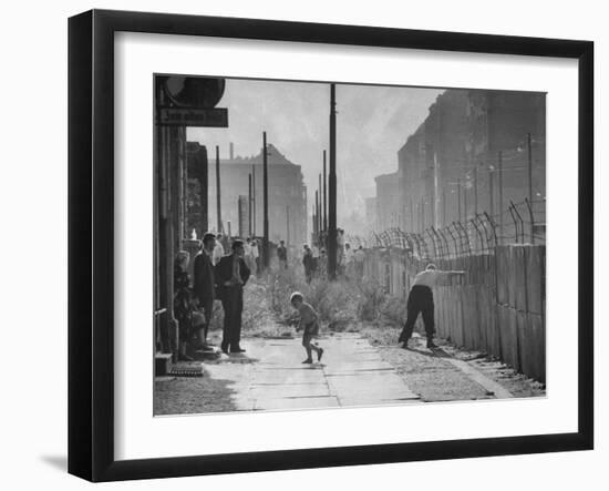 Barbed-Wire Tops Berlin Wall; West Berliners Gather Nearby-null-Framed Photographic Print