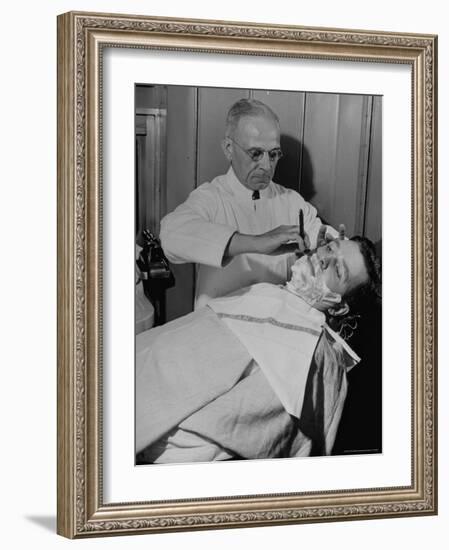 Barber Victor E. Aceto Shaving Passenger Aboard the 20th Century Limited-Alfred Eisenstaedt-Framed Photographic Print