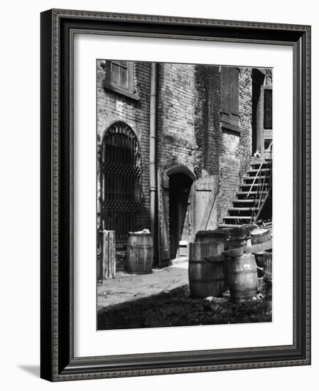 Barrels and Staircase in Alley on the Bowery, New York-Emil Otto Hoppé-Framed Photographic Print