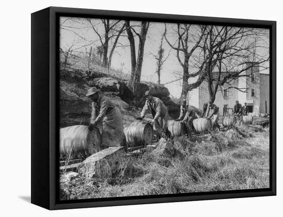 Barrels Being Rolled on Wooden Rails at Jack Daniels Distillery-Ed Clark-Framed Premier Image Canvas