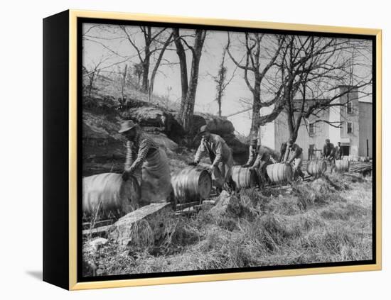 Barrels Being Rolled on Wooden Rails at Jack Daniels Distillery-Ed Clark-Framed Premier Image Canvas