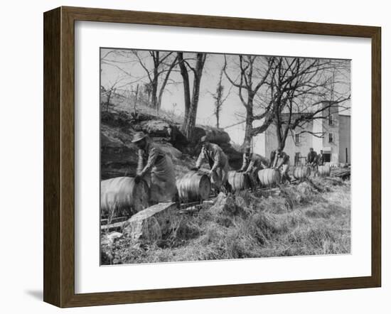 Barrels Being Rolled on Wooden Rails at Jack Daniels Distillery-Ed Clark-Framed Premium Photographic Print