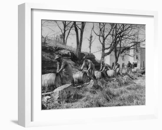 Barrels Being Rolled on Wooden Rails at Jack Daniels Distillery-Ed Clark-Framed Photographic Print