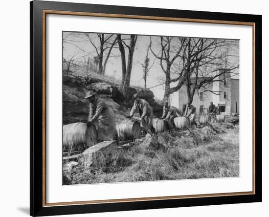 Barrels Being Rolled on Wooden Rails at Jack Daniels Distillery-Ed Clark-Framed Photographic Print