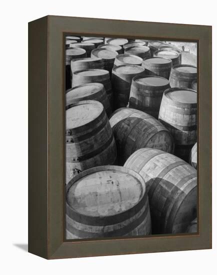 Barrels Sitting in Warehouse at Jack Daniels Distillery-Ed Clark-Framed Premier Image Canvas