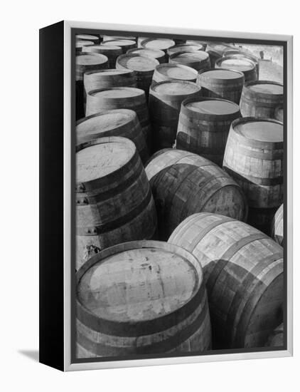 Barrels Sitting in Warehouse at Jack Daniels Distillery-Ed Clark-Framed Premier Image Canvas