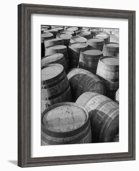 Barrels Sitting in Warehouse at Jack Daniels Distillery-Ed Clark-Framed Photographic Print