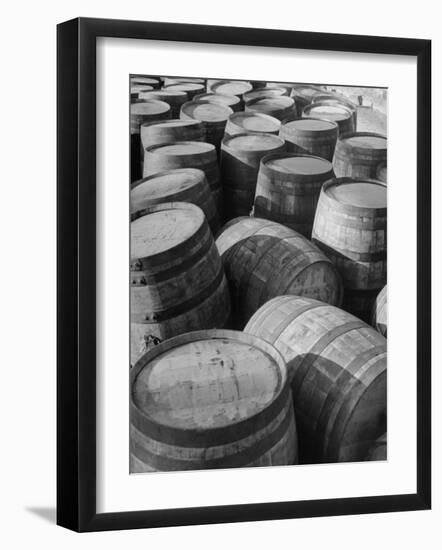 Barrels Sitting in Warehouse at Jack Daniels Distillery-Ed Clark-Framed Photographic Print