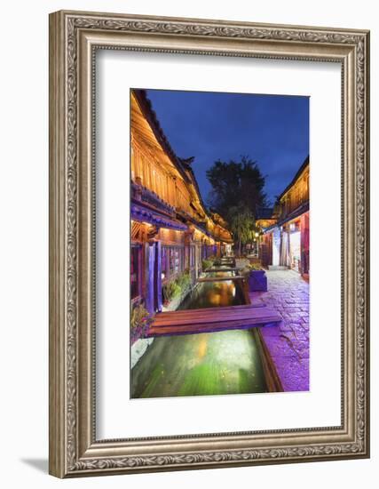 Bars and restaurants along canal at dusk, Lijiang, UNESCO World Heritage Site, Yunnan, China, Asia-Ian Trower-Framed Photographic Print