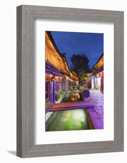 Bars and restaurants along canal at dusk, Lijiang, UNESCO World Heritage Site, Yunnan, China, Asia-Ian Trower-Framed Photographic Print