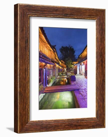 Bars and restaurants along canal at dusk, Lijiang, UNESCO World Heritage Site, Yunnan, China, Asia-Ian Trower-Framed Photographic Print