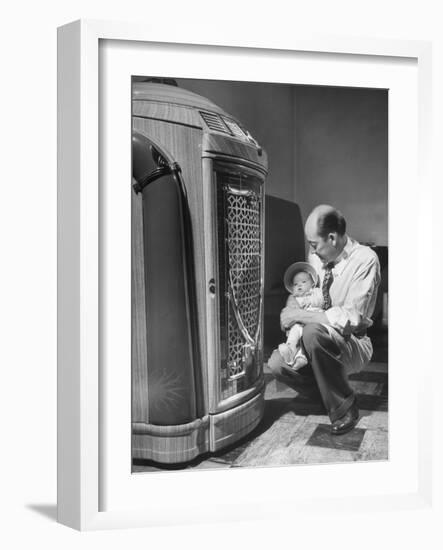 Bartender at the Sawteeth Club, Jack Wills with His Daughter Jane Listening to the Jukebox-null-Framed Photographic Print