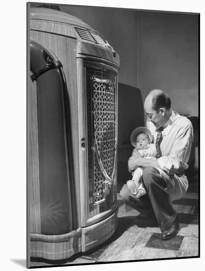 Bartender at the Sawteeth Club, Jack Wills with His Daughter Jane Listening to the Jukebox-null-Mounted Photographic Print