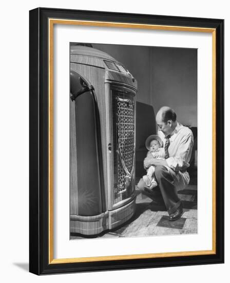 Bartender at the Sawteeth Club, Jack Wills with His Daughter Jane Listening to the Jukebox-null-Framed Photographic Print