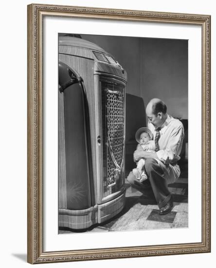 Bartender at the Sawteeth Club, Jack Wills with His Daughter Jane Listening to the Jukebox-null-Framed Photographic Print
