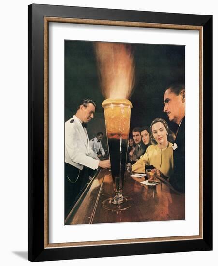 Bartender Tending Bar in the Zebra Room of the Town House, Los Angeles, California, 1946-Walter Sanders-Framed Photographic Print