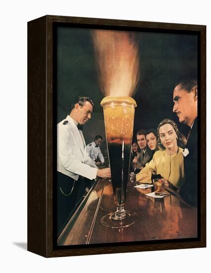 Bartender Tending Bar in the Zebra Room of the Town House, Los Angeles, California, 1946-Walter Sanders-Framed Premier Image Canvas