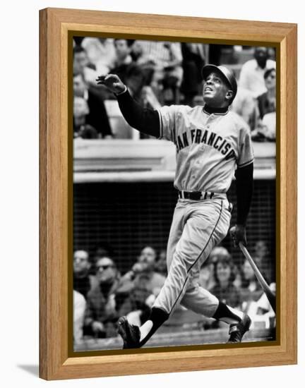 Baseball Player Willie Mays Watching Ball Clear Fence for Home Run in Game with Dodgers-Ralph Morse-Framed Premier Image Canvas