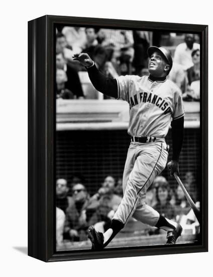 Baseball Player Willie Mays Watching Ball Clear Fence for Home Run in Game with Dodgers-Ralph Morse-Framed Premier Image Canvas