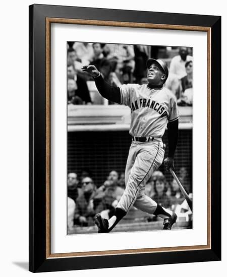 Baseball Player Willie Mays Watching Ball Clear Fence for Home Run in Game with Dodgers-Ralph Morse-Framed Premium Photographic Print