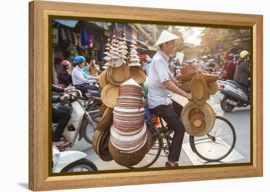 Basket and Hat Seller on Bicycle, Hanoi, Vietnam-Peter Adams-Framed Premier Image Canvas