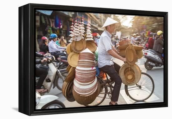 Basket and Hat Seller on Bicycle, Hanoi, Vietnam-Peter Adams-Framed Premier Image Canvas