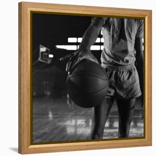 Basketball Held by Player Wilt Chamberlain, 1956-Frank Scherschel-Framed Premier Image Canvas