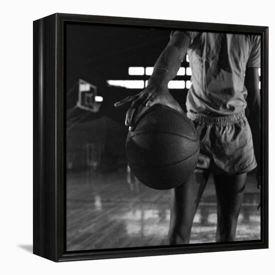 Basketball Held by Player Wilt Chamberlain, 1956-Frank Scherschel-Framed Premier Image Canvas