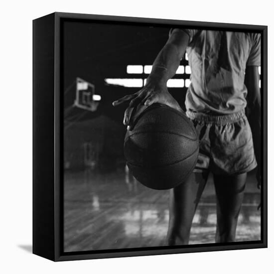 Basketball Held by Player Wilt Chamberlain, 1956-Frank Scherschel-Framed Premier Image Canvas