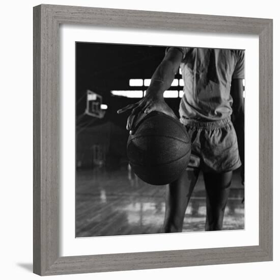 Basketball Held by Player Wilt Chamberlain, 1956-Frank Scherschel-Framed Photographic Print