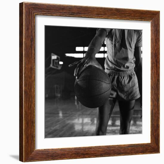 Basketball Held by Player Wilt Chamberlain, 1956-Frank Scherschel-Framed Photographic Print