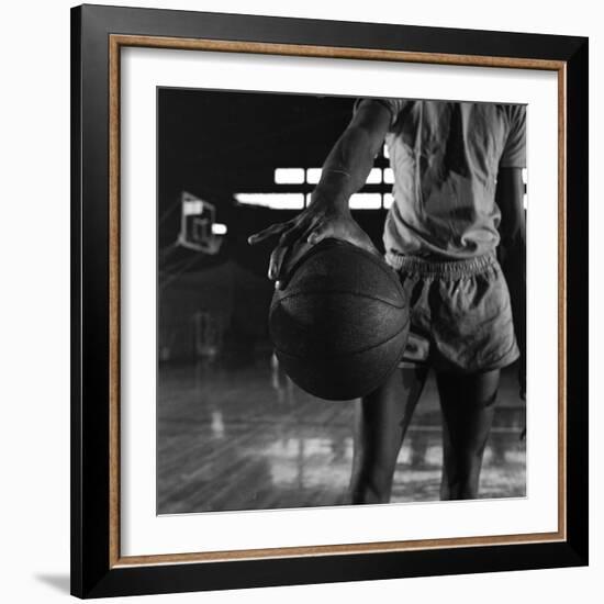 Basketball Held by Player Wilt Chamberlain, 1956-Frank Scherschel-Framed Photographic Print