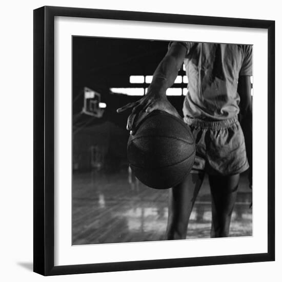 Basketball Held by Player Wilt Chamberlain, 1956-Frank Scherschel-Framed Photographic Print