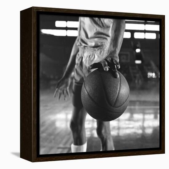 Basketball Held by Player Wilt Chamberlain, 1956-Frank Scherschel-Framed Premier Image Canvas